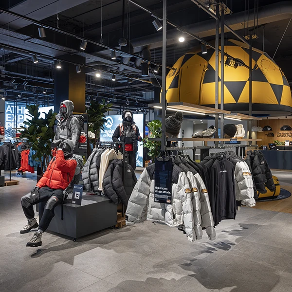 Clothing display in London’s The North Face Retail Store, with the custom-designed Dome Tent in the background